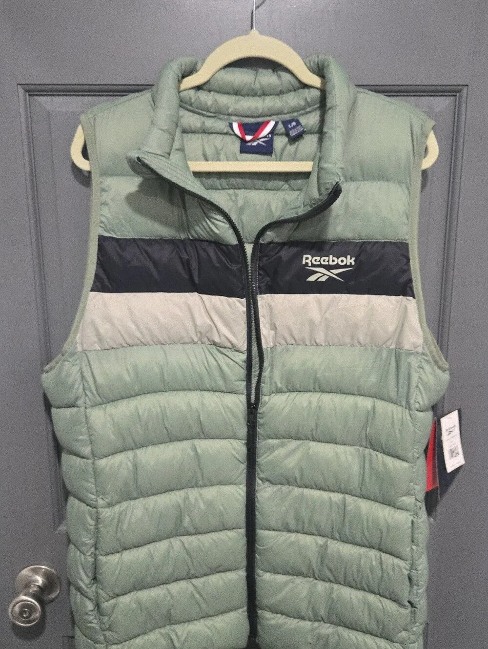 Reebok Men's Sage Green Quilted Puffer Vest with Navy Black and Cream Panels
